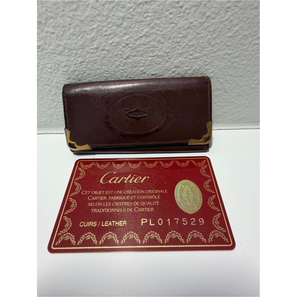 Cartier Brownish Red Leather Card Holder with Gold Corner Accents